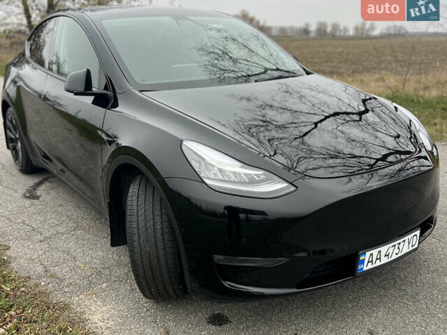 Черный Тесла Model Y, объемом двигателя 0 л и пробегом 97 тыс. км за 19999 $, фото 1 на Automoto.ua