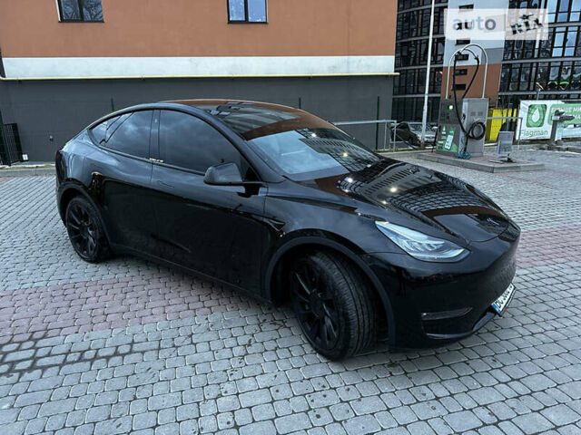 Черный Тесла Model Y, объемом двигателя 0 л и пробегом 26 тыс. км за 39500 $, фото 24 на Automoto.ua