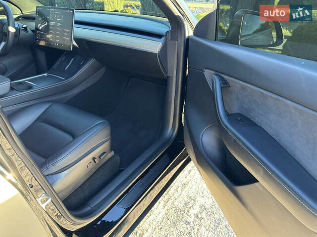Черный Тесла Model Y, объемом двигателя 0 л и пробегом 60 тыс. км за 22999 $, фото 27 на Automoto.ua
