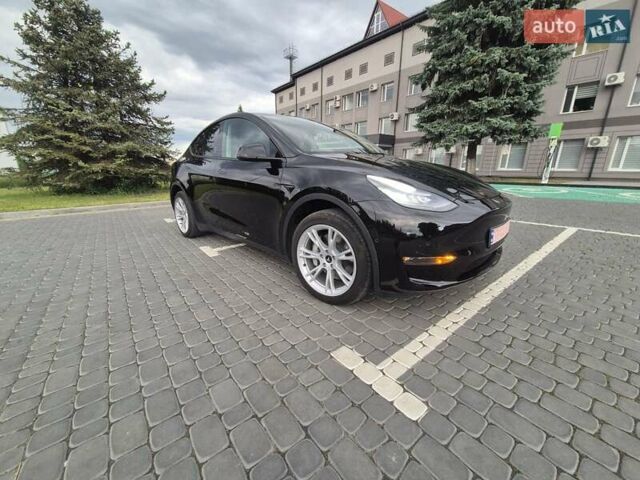 Черный Тесла Model Y, объемом двигателя 0 л и пробегом 104 тыс. км за 23700 $, фото 1 на Automoto.ua