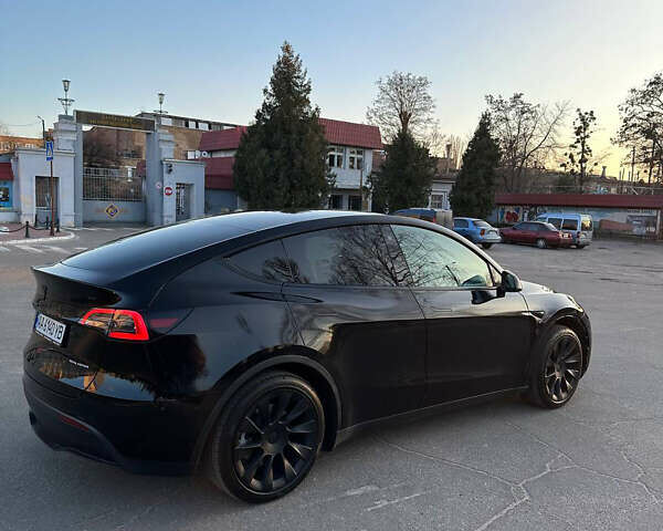 Чорний Тесла Model Y, об'ємом двигуна 0 л та пробігом 56 тис. км за 31000 $, фото 6 на Automoto.ua