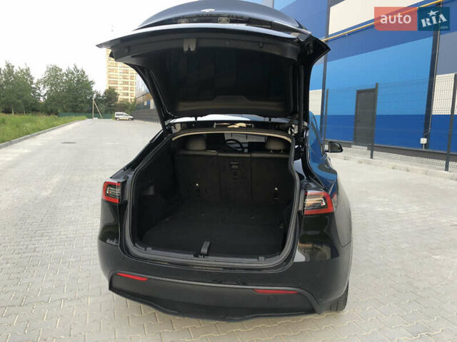 Черный Тесла Model Y, объемом двигателя 0 л и пробегом 63 тыс. км за 27500 $, фото 28 на Automoto.ua