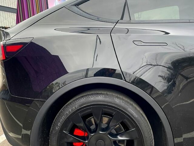 Черный Тесла Model Y, объемом двигателя 0 л и пробегом 52 тыс. км за 29988 $, фото 6 на Automoto.ua