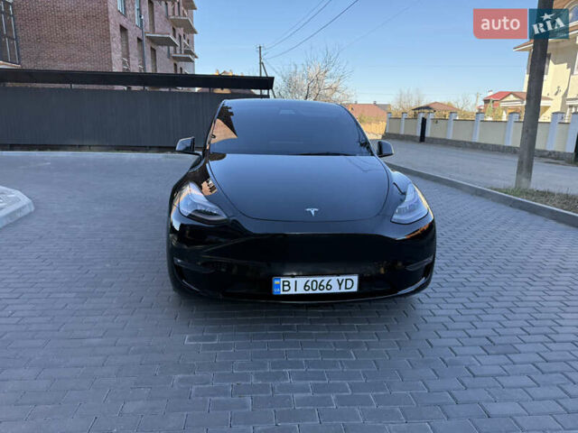 Черный Тесла Model Y, объемом двигателя 0 л и пробегом 68 тыс. км за 28500 $, фото 77 на Automoto.ua