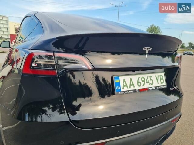 Черный Тесла Model Y, объемом двигателя 0 л и пробегом 128 тыс. км за 29999 $, фото 5 на Automoto.ua