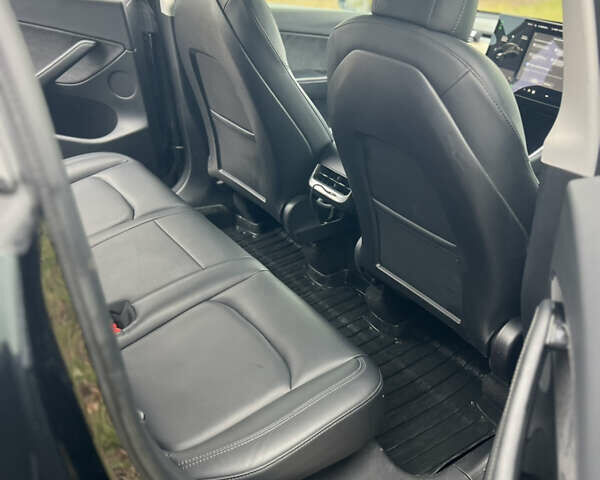 Черный Тесла Model Y, объемом двигателя 0 л и пробегом 97 тыс. км за 19999 $, фото 10 на Automoto.ua