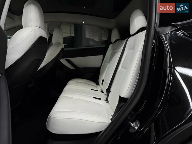 Черный Тесла Model Y, объемом двигателя 0 л и пробегом 70 тыс. км за 26900 $, фото 22 на Automoto.ua