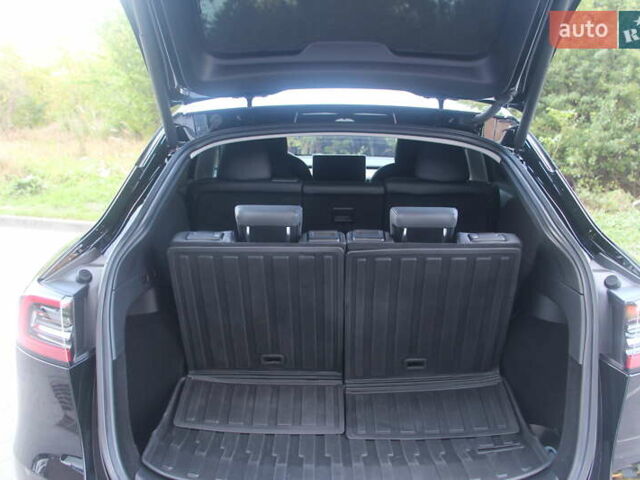 Черный Тесла Model Y, объемом двигателя 0 л и пробегом 56 тыс. км за 27499 $, фото 17 на Automoto.ua