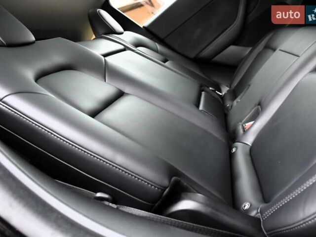 Черный Тесла Model Y, объемом двигателя 0 л и пробегом 73 тыс. км за 25950 $, фото 58 на Automoto.ua
