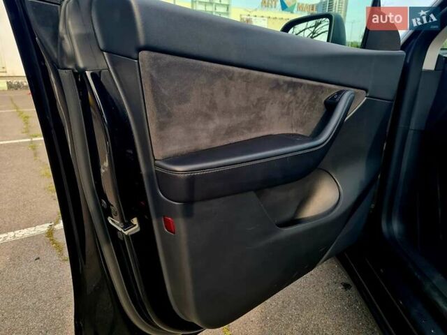 Черный Тесла Model Y, объемом двигателя 0 л и пробегом 128 тыс. км за 29999 $, фото 28 на Automoto.ua