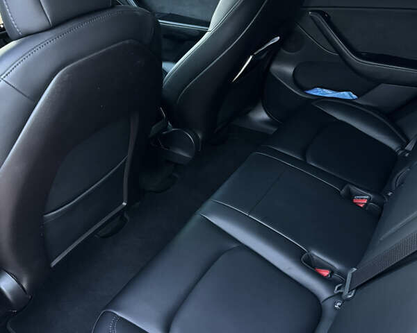 Черный Тесла Model Y, объемом двигателя 0 л и пробегом 102 тыс. км за 24999 $, фото 6 на Automoto.ua