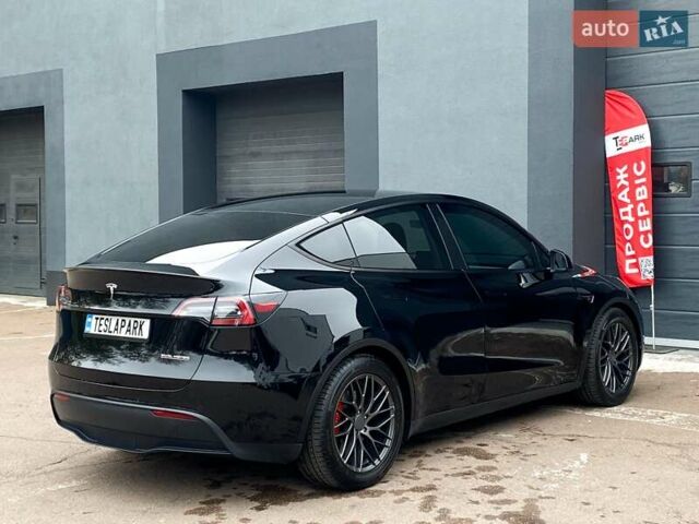Чорний Тесла Model Y, об'ємом двигуна 0 л та пробігом 73 тис. км за 28500 $, фото 9 на Automoto.ua