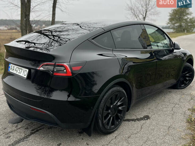 Черный Тесла Model Y, объемом двигателя 0 л и пробегом 97 тыс. км за 19999 $, фото 3 на Automoto.ua