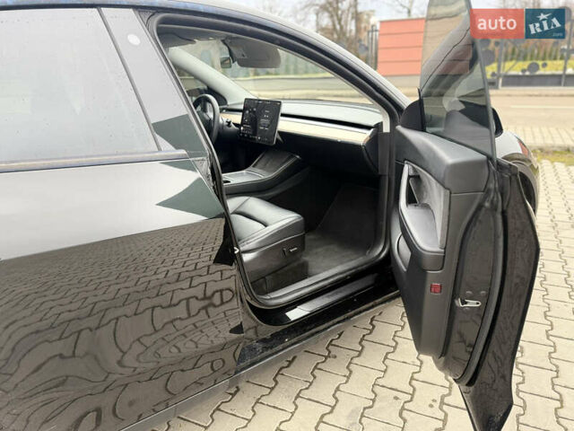 Черный Тесла Model Y, объемом двигателя 0 л и пробегом 55 тыс. км за 26300 $, фото 16 на Automoto.ua