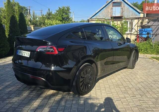 Черный Тесла Model Y, объемом двигателя 0 л и пробегом 98 тыс. км за 24700 $, фото 4 на Automoto.ua