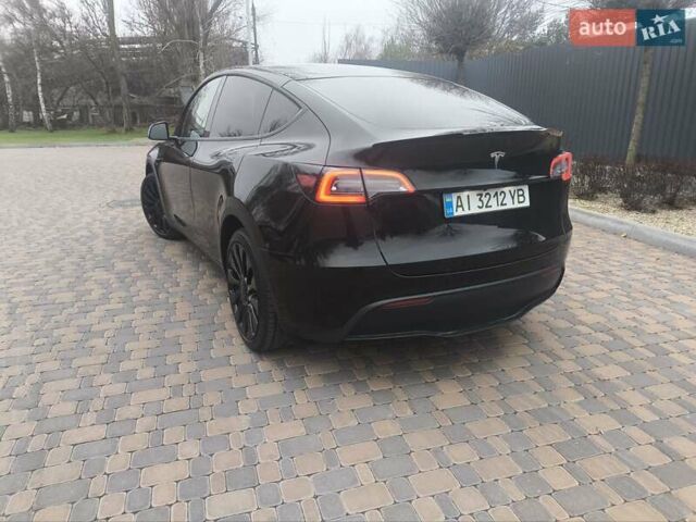 Чорний Тесла Model Y, об'ємом двигуна 0 л та пробігом 77 тис. км за 23900 $, фото 27 на Automoto.ua