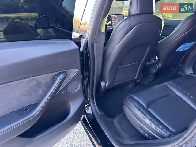 Черный Тесла Model Y, объемом двигателя 0 л и пробегом 60 тыс. км за 22999 $, фото 21 на Automoto.ua
