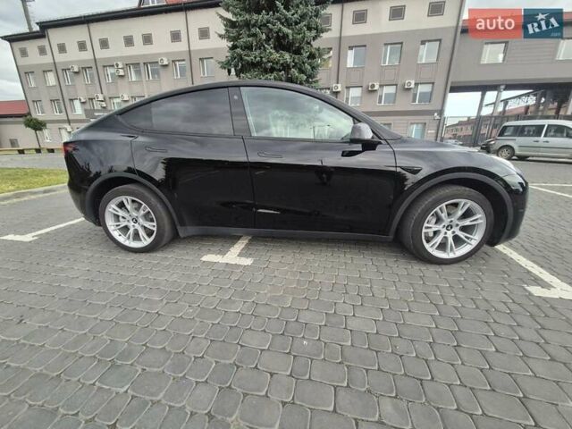 Черный Тесла Model Y, объемом двигателя 0 л и пробегом 104 тыс. км за 23700 $, фото 2 на Automoto.ua
