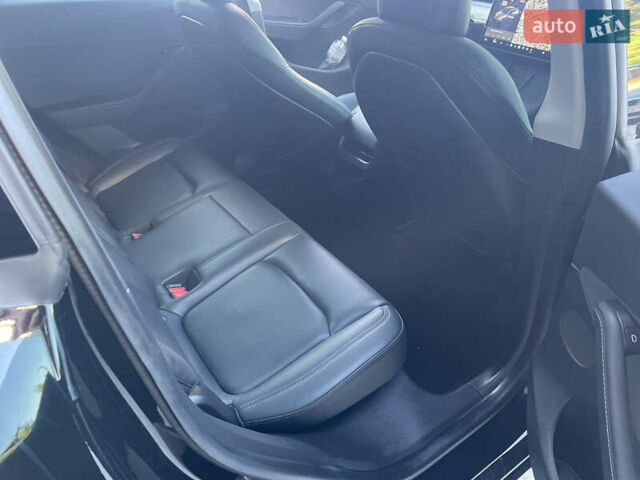 Черный Тесла Model Y, объемом двигателя 0 л и пробегом 77 тыс. км за 22700 $, фото 15 на Automoto.ua
