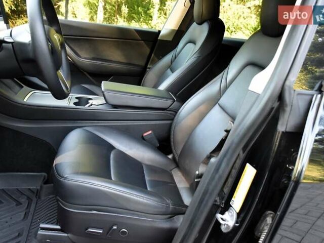 Черный Тесла Model Y, объемом двигателя 0 л и пробегом 82 тыс. км за 24950 $, фото 32 на Automoto.ua