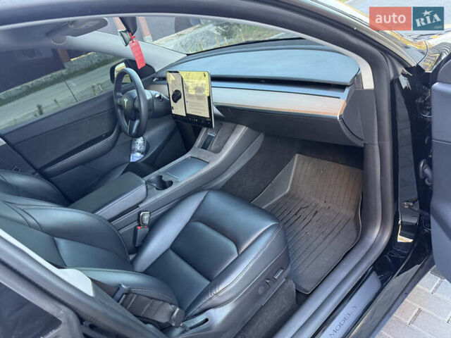 Черный Тесла Model Y, объемом двигателя 0 л и пробегом 68 тыс. км за 28500 $, фото 124 на Automoto.ua