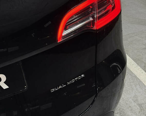 Черный Тесла Model Y, объемом двигателя 0 л и пробегом 124 тыс. км за 24900 $, фото 12 на Automoto.ua