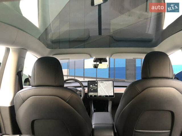 Черный Тесла Model Y, объемом двигателя 0 л и пробегом 63 тыс. км за 27500 $, фото 22 на Automoto.ua
