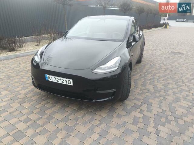 Чорний Тесла Model Y, об'ємом двигуна 0 л та пробігом 77 тис. км за 23900 $, фото 11 на Automoto.ua