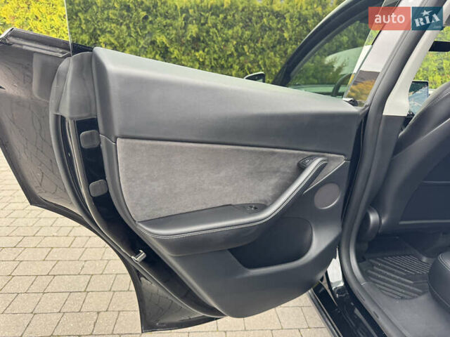 Чорний Тесла Model Y, об'ємом двигуна 0 л та пробігом 62 тис. км за 24999 $, фото 54 на Automoto.ua