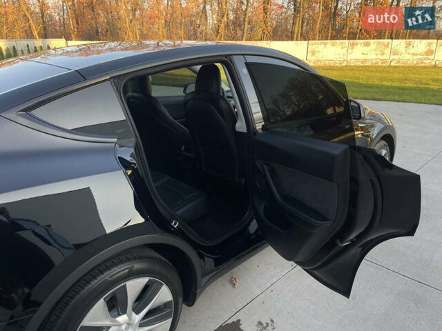 Чорний Тесла Model Y, об'ємом двигуна 0 л та пробігом 116 тис. км за 21800 $, фото 36 на Automoto.ua