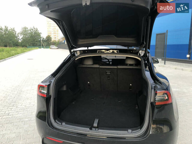 Черный Тесла Model Y, объемом двигателя 0 л и пробегом 63 тыс. км за 27500 $, фото 25 на Automoto.ua