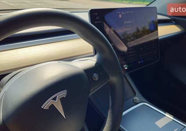 Черный Тесла Model Y, объемом двигателя 0 л и пробегом 99 тыс. км за 27000 $, фото 16 на Automoto.ua