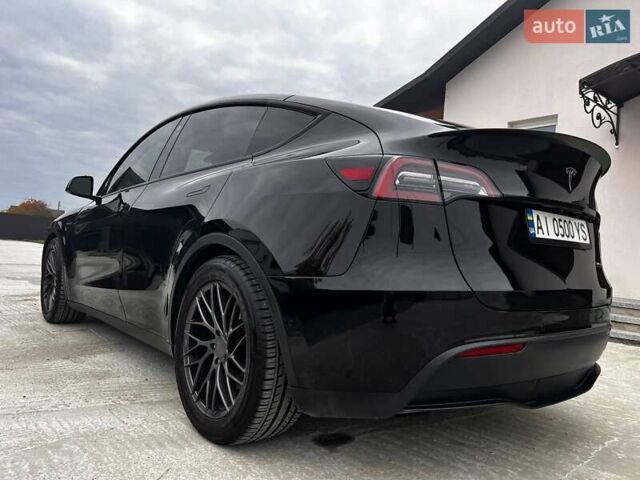 Чорний Тесла Model Y, об'ємом двигуна 0 л та пробігом 73 тис. км за 27999 $, фото 4 на Automoto.ua