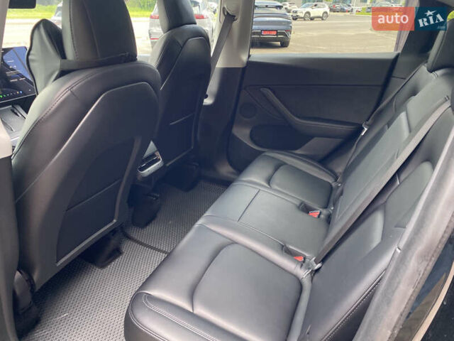Черный Тесла Model Y, объемом двигателя 0 л и пробегом 74 тыс. км за 27699 $, фото 17 на Automoto.ua