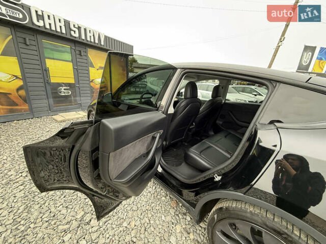 Чорний Тесла Model Y, об'ємом двигуна 0 л та пробігом 62 тис. км за 24999 $, фото 49 на Automoto.ua