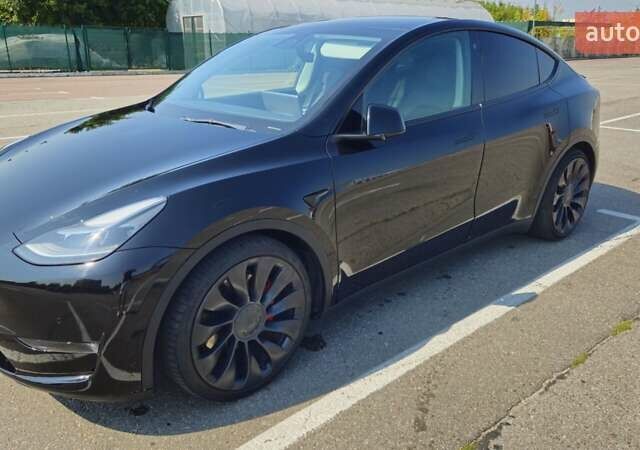 Черный Тесла Model Y, объемом двигателя 0 л и пробегом 99 тыс. км за 27000 $, фото 13 на Automoto.ua