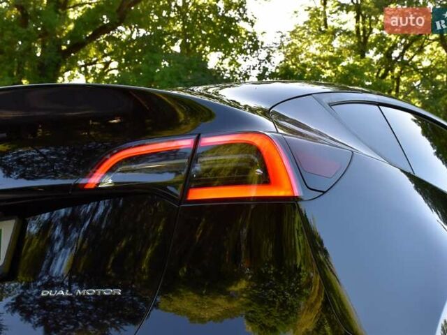 Черный Тесла Model Y, объемом двигателя 0 л и пробегом 82 тыс. км за 24950 $, фото 21 на Automoto.ua