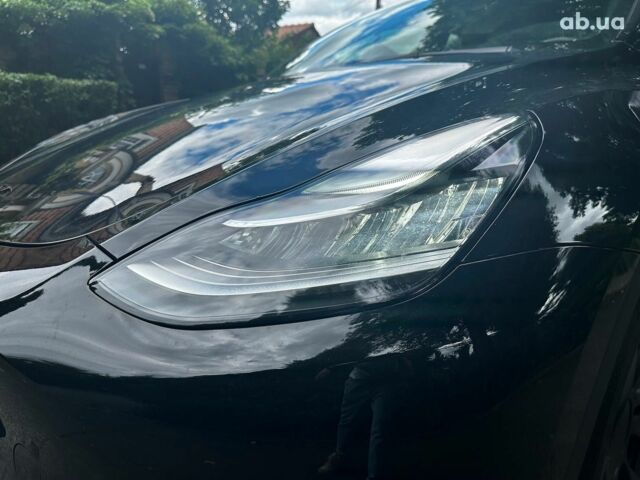 Черный Тесла Model Y, объемом двигателя 0 л и пробегом 136 тыс. км за 23990 $, фото 25 на Automoto.ua