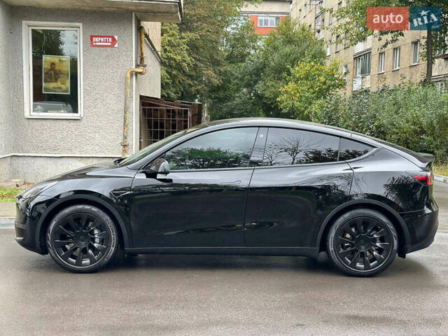 Черный Тесла Model Y, объемом двигателя 0 л и пробегом 82 тыс. км за 26000 $, фото 10 на Automoto.ua