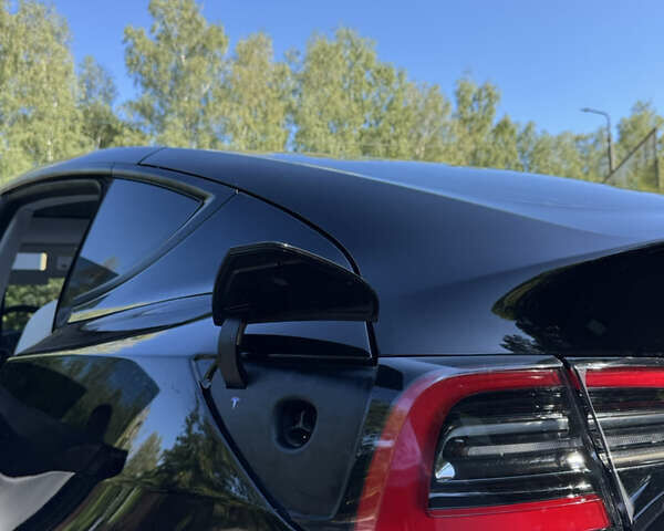 Черный Тесла Model Y, объемом двигателя 0 л и пробегом 113 тыс. км за 22222 $, фото 25 на Automoto.ua