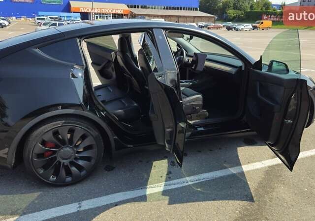Черный Тесла Model Y, объемом двигателя 0 л и пробегом 99 тыс. км за 27000 $, фото 9 на Automoto.ua