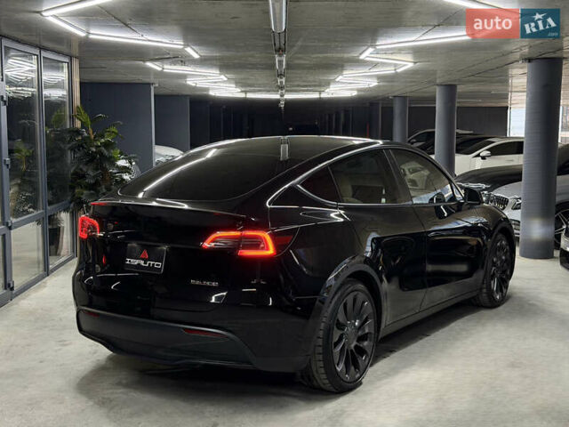 Черный Тесла Model Y, объемом двигателя 0 л и пробегом 70 тыс. км за 26900 $, фото 13 на Automoto.ua