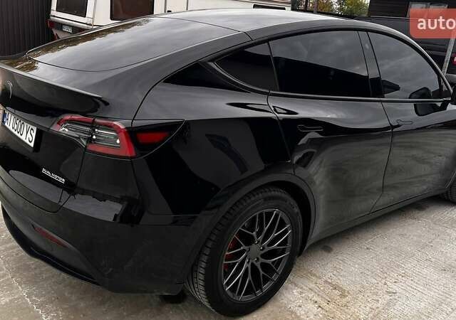 Чорний Тесла Model Y, об'ємом двигуна 0 л та пробігом 73 тис. км за 27999 $, фото 12 на Automoto.ua