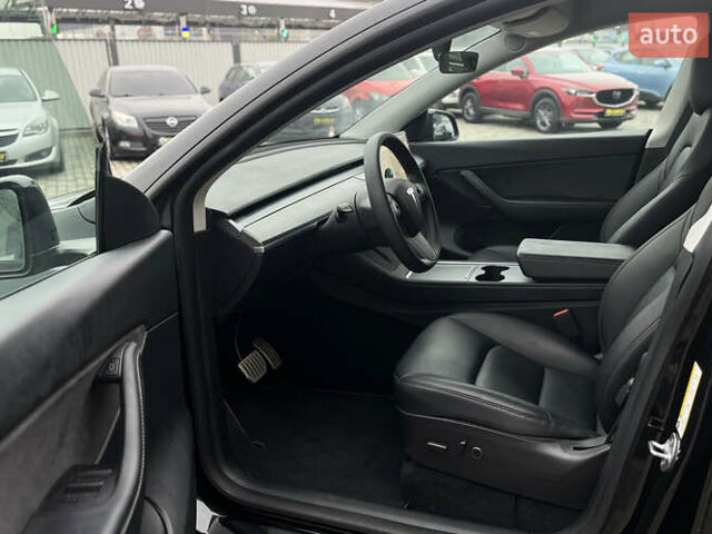 Черный Тесла Model Y, объемом двигателя 0 л и пробегом 10 тыс. км за 29400 $, фото 10 на Automoto.ua