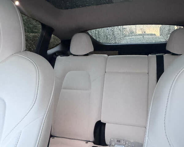 Черный Тесла Model Y, объемом двигателя 0 л и пробегом 79 тыс. км за 34000 $, фото 3 на Automoto.ua