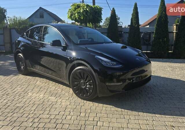 Черный Тесла Model Y, объемом двигателя 0 л и пробегом 98 тыс. км за 24700 $, фото 1 на Automoto.ua