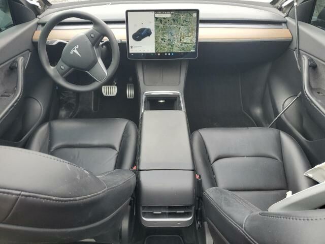 Черный Тесла Model Y, объемом двигателя 0 л и пробегом 68 тыс. км за 18950 $, фото 7 на Automoto.ua