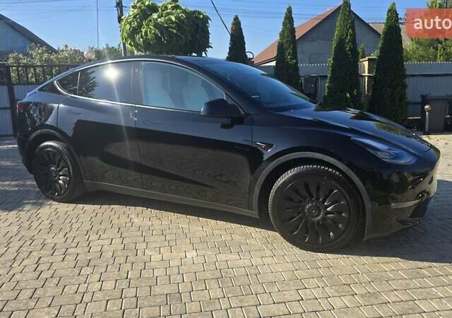 Черный Тесла Model Y, объемом двигателя 0 л и пробегом 98 тыс. км за 24700 $, фото 2 на Automoto.ua