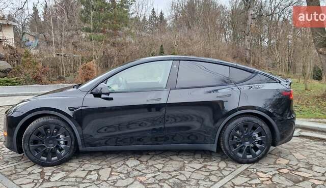 Чорний Тесла Model Y, об'ємом двигуна 0 л та пробігом 73 тис. км за 30300 $, фото 2 на Automoto.ua