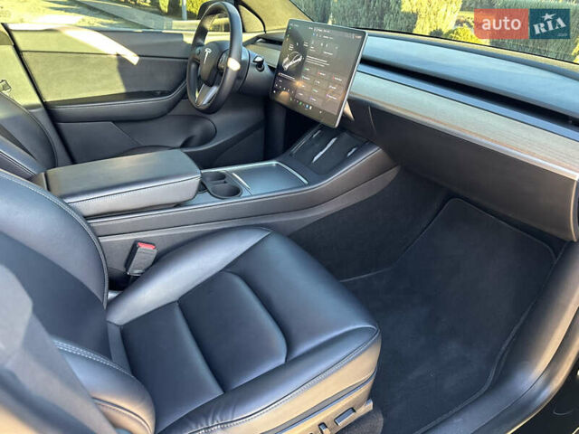 Черный Тесла Model Y, объемом двигателя 0 л и пробегом 60 тыс. км за 22999 $, фото 28 на Automoto.ua